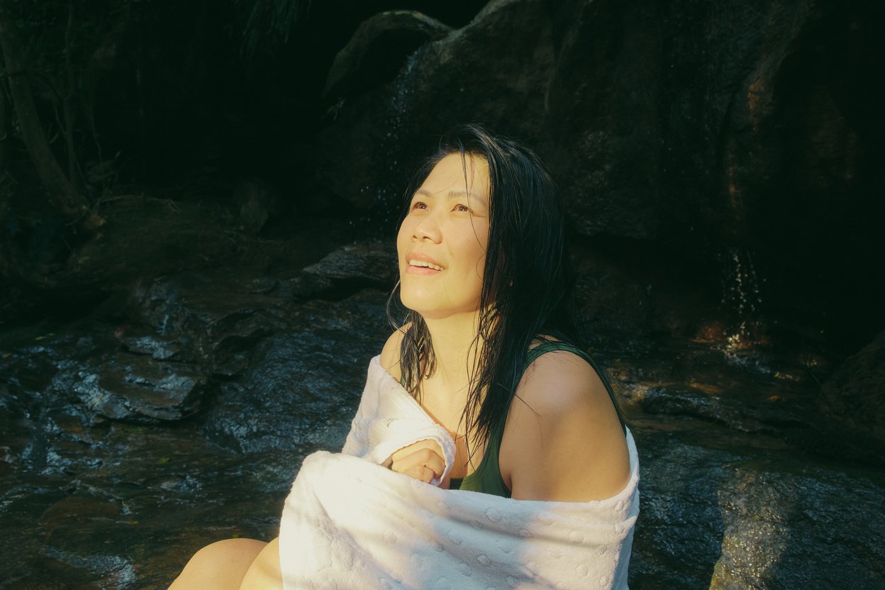 Travel: Tree Climbing Sun Shining on Woman Outdoors